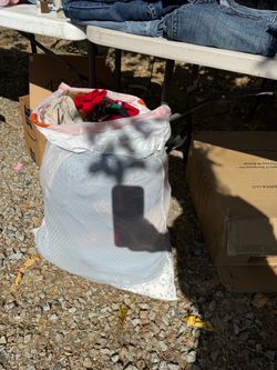 Trash bag of xs/small clothes