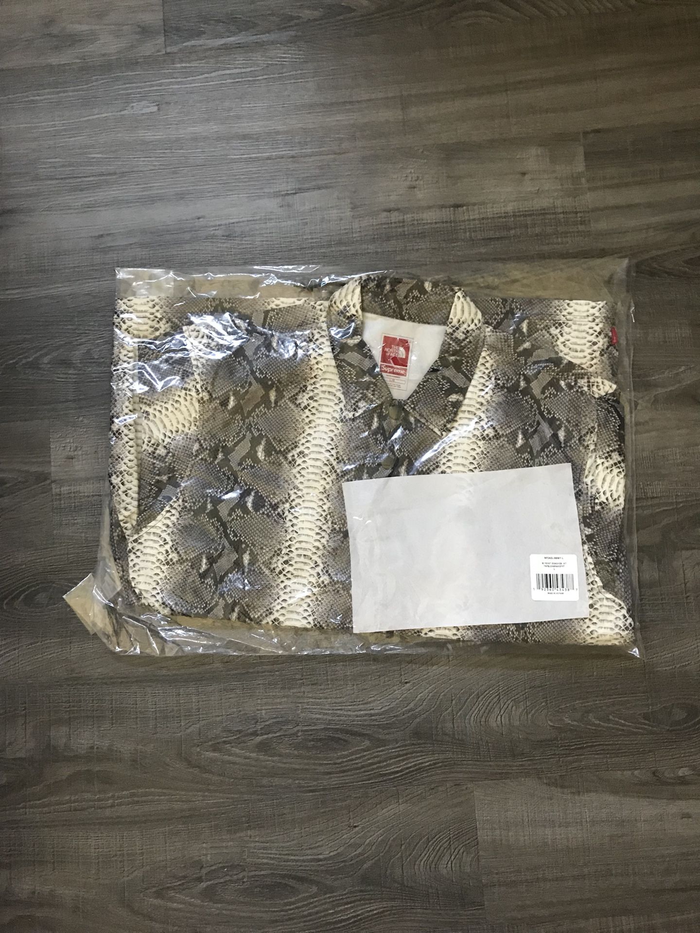 Supreme TNF Snakeskin Taped Seam Coaches Jacket
