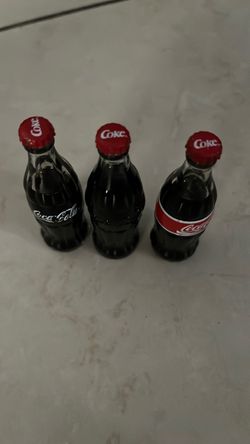 Vintage Coca-Cola bottles $35 for three