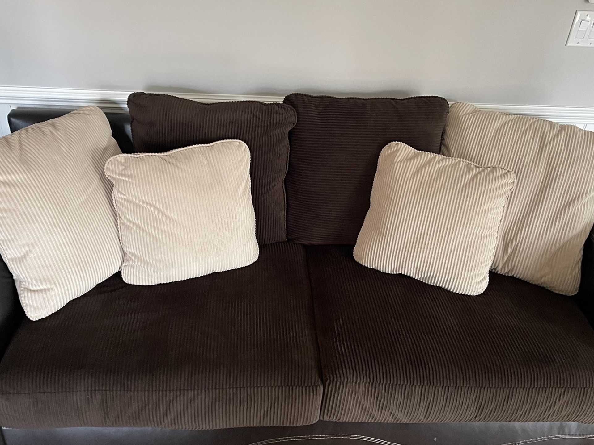 Chocolate Leather Couch And Rotating Loveseat