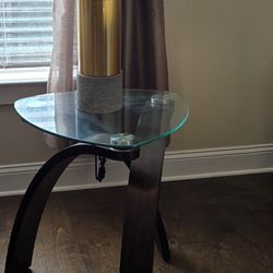 Three Glass end tables with coffee table and lamps