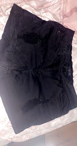 Black ripped shorts