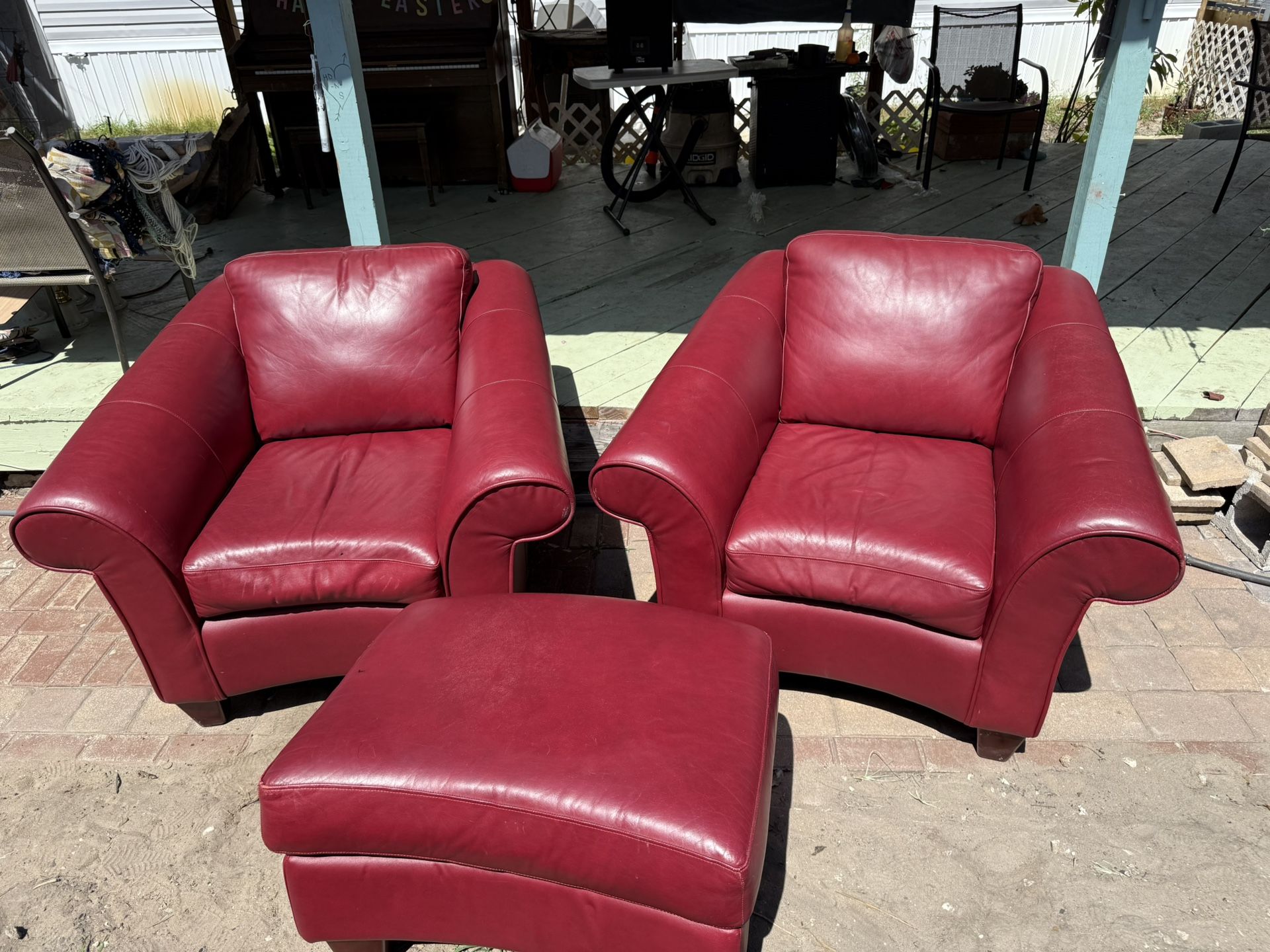 Two Faux Leather Chairs With Ottoman