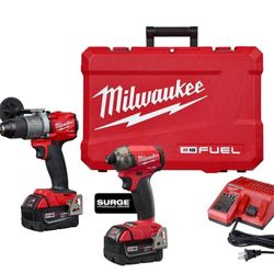 Milwaukee m18 fuel hammer drill and surge hydraulic driver with 2x 5ah battery and charger