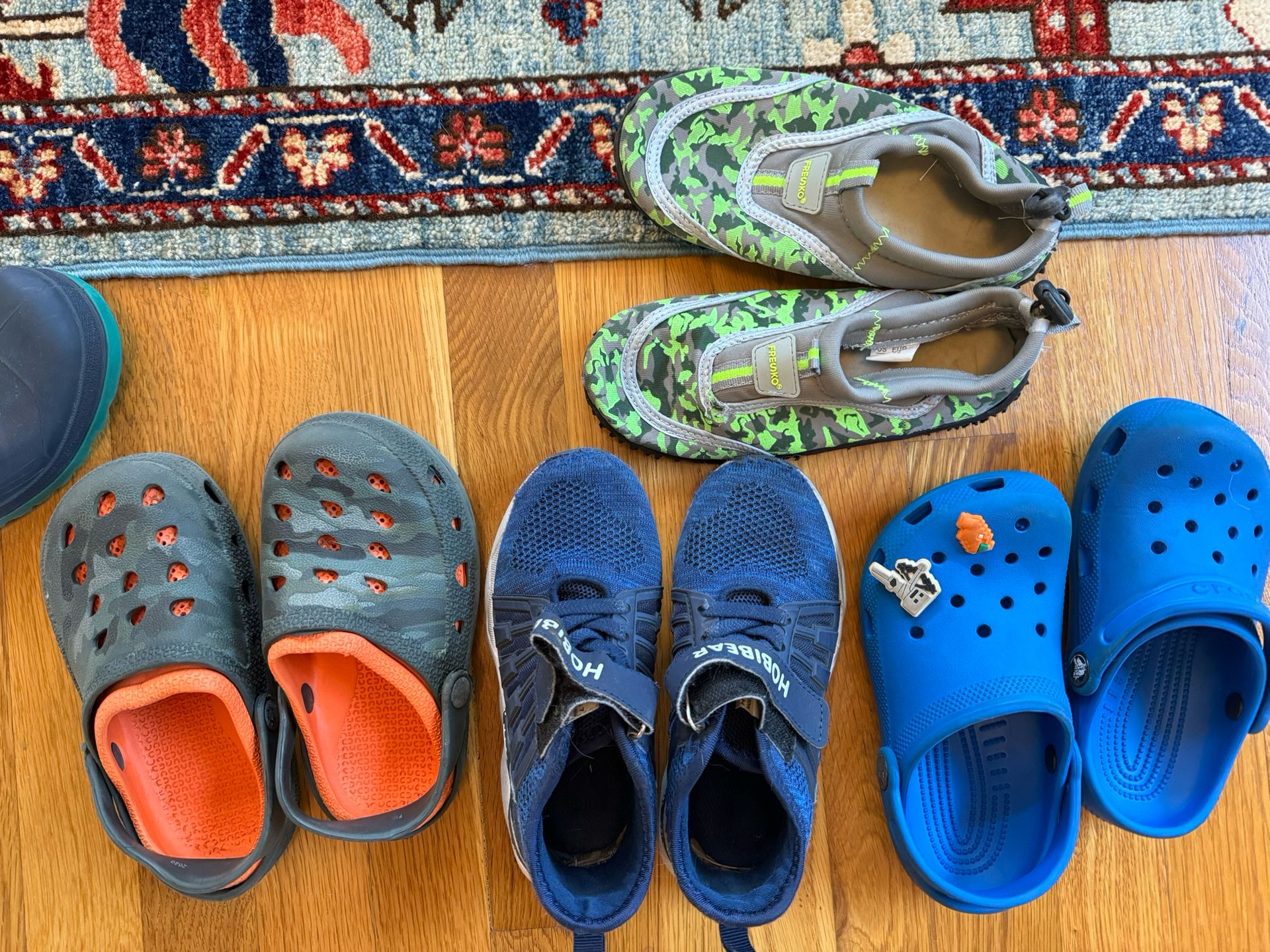 Five pairs of boys shoes / rain boots