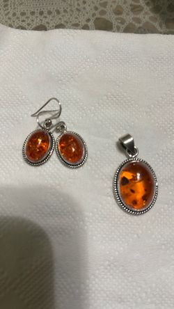 Aretes y medallas Anber de 925 plata