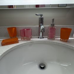 Pink and orange bathroom accessory set