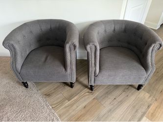 Pair of Grey Tufted Barrel Chairs