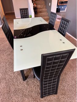 Glass dinning table and chairs