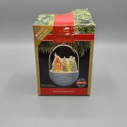 Vintage Hallmark Magic Keepsake Christmas Ornament Bringing Home the Tree 1991