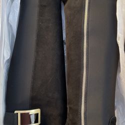 black knee-high suede Calvin Klein boots with beautiful gold detailing