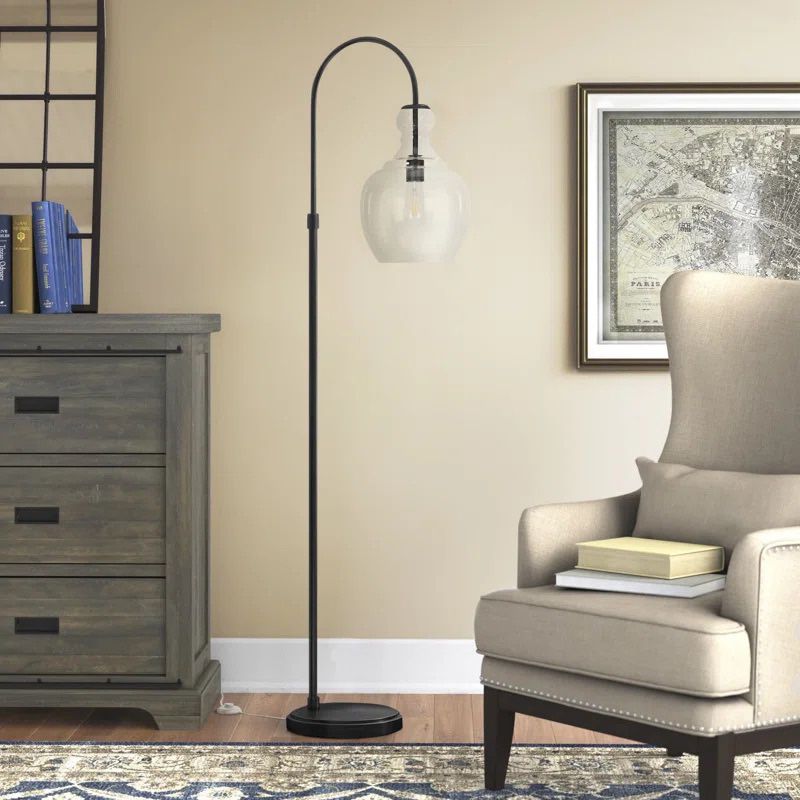{ONE} Alden 70'' Arched/Arc Floor Lamp. Finish: black/bronze. By Beachcrest House. Shade: clear glass. MSRP: $156. Our price: $101 + Sales tax