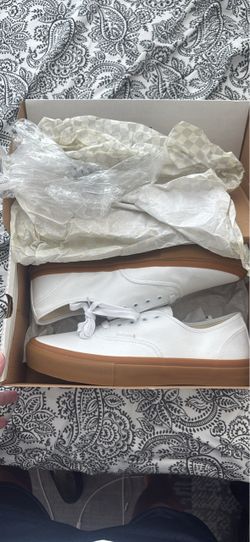 Vans shoes. White and brown. Never worn. 11.5