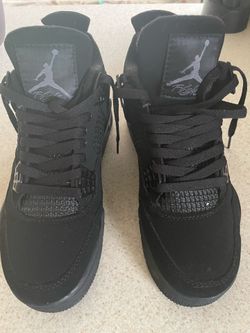 Womans Air Jordan 4 black cat