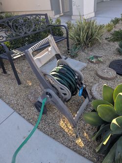 Garden hose with rolling cart