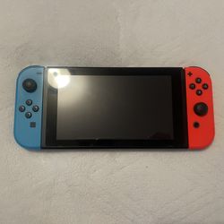 Nintendo Switch With Two Mario Games