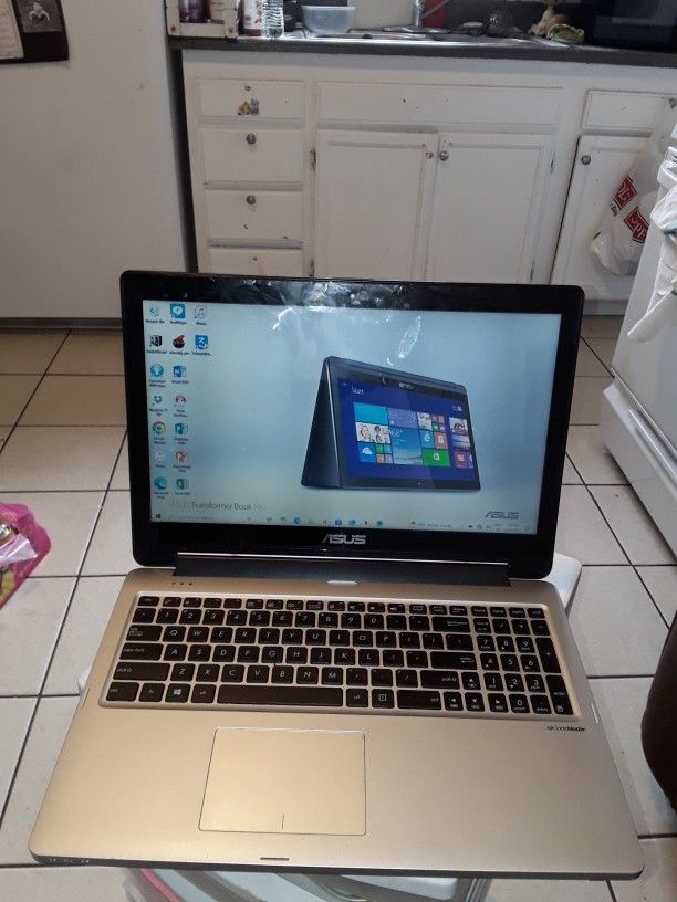 ASUS Lap Top  15.6 InchTransformer Flip Book TP55DL LAPTOP 2 IN 1  Charger Included 