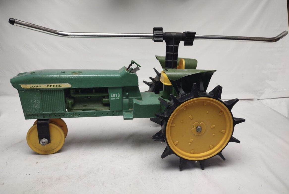 John Deere 4010 Diesel Tractor Traveling Lawn Sprinkler
