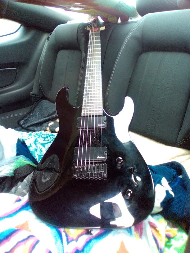 Another Price Drop!!! Last One Was 225$ Then 175$ Now Final Price Drop 149$.......Jackson 7 String Electric Guitar You 