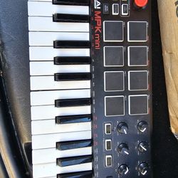 Akai Professional MPK mini MIDI keyboard controller.