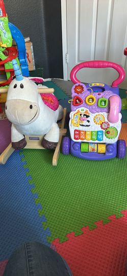 V-tech sit to stand learning walker and unicorn plush rocker