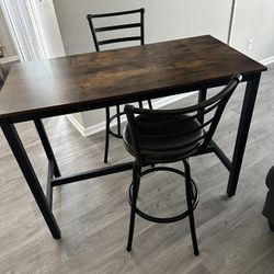 Table With Two Bar Stool Chairs