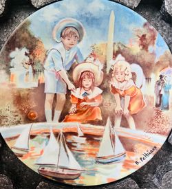 This is a vintage 1985 Limoges porcelain collector plate titled "Setting Sail at the Tuileries" (or "Petits Voiliers au Bassin des Tuileries") from th
