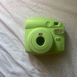green instax mini 9 camera