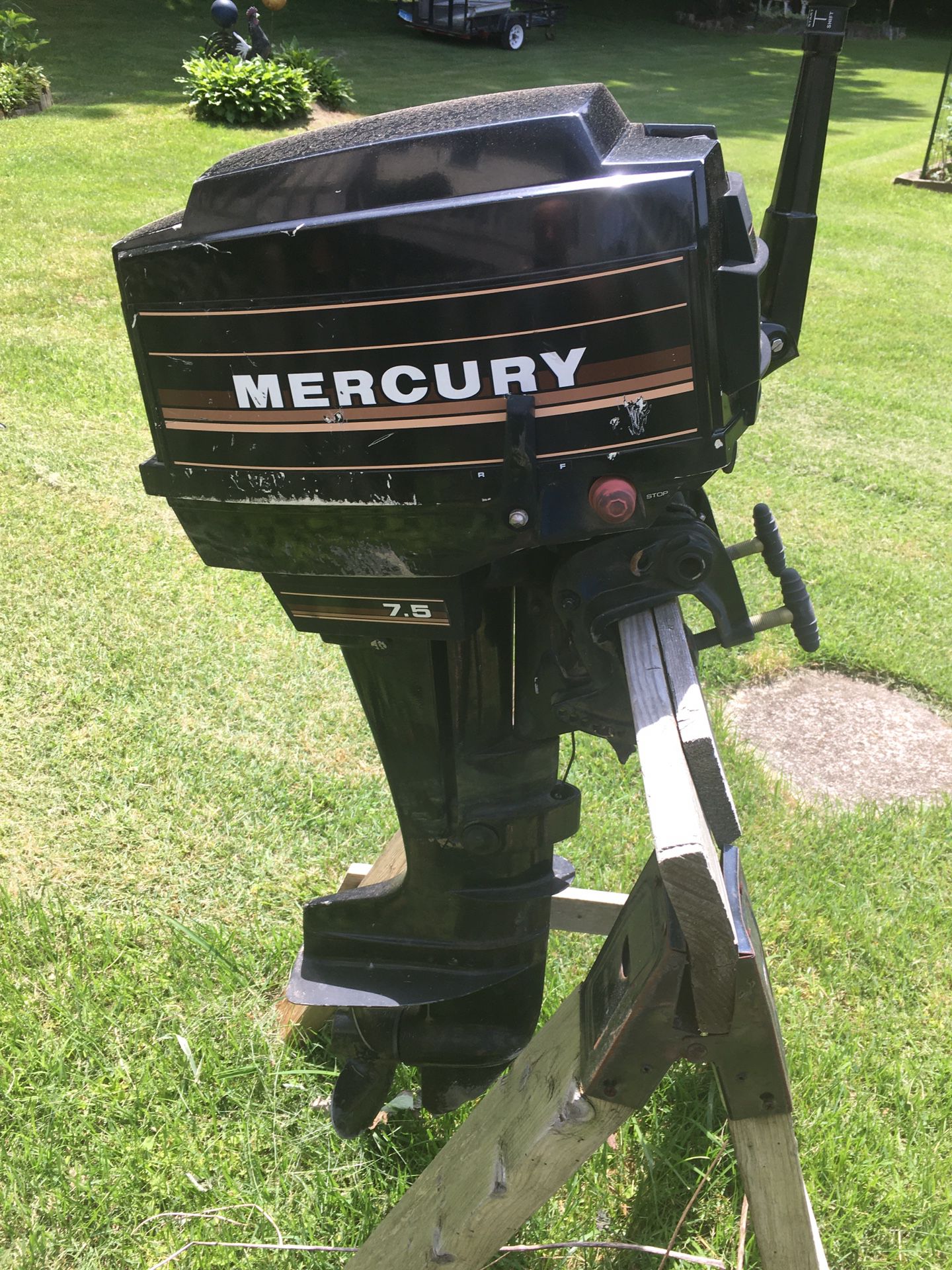 1985 Mercury 7.5 hp outboard motor and fuel tank