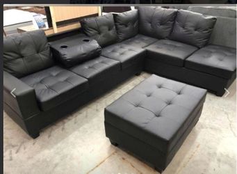 New Black Sectional With Storage Ottoman