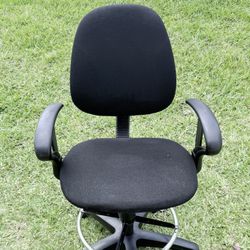 Selling a drafting chair with a foot ring, swivel base /