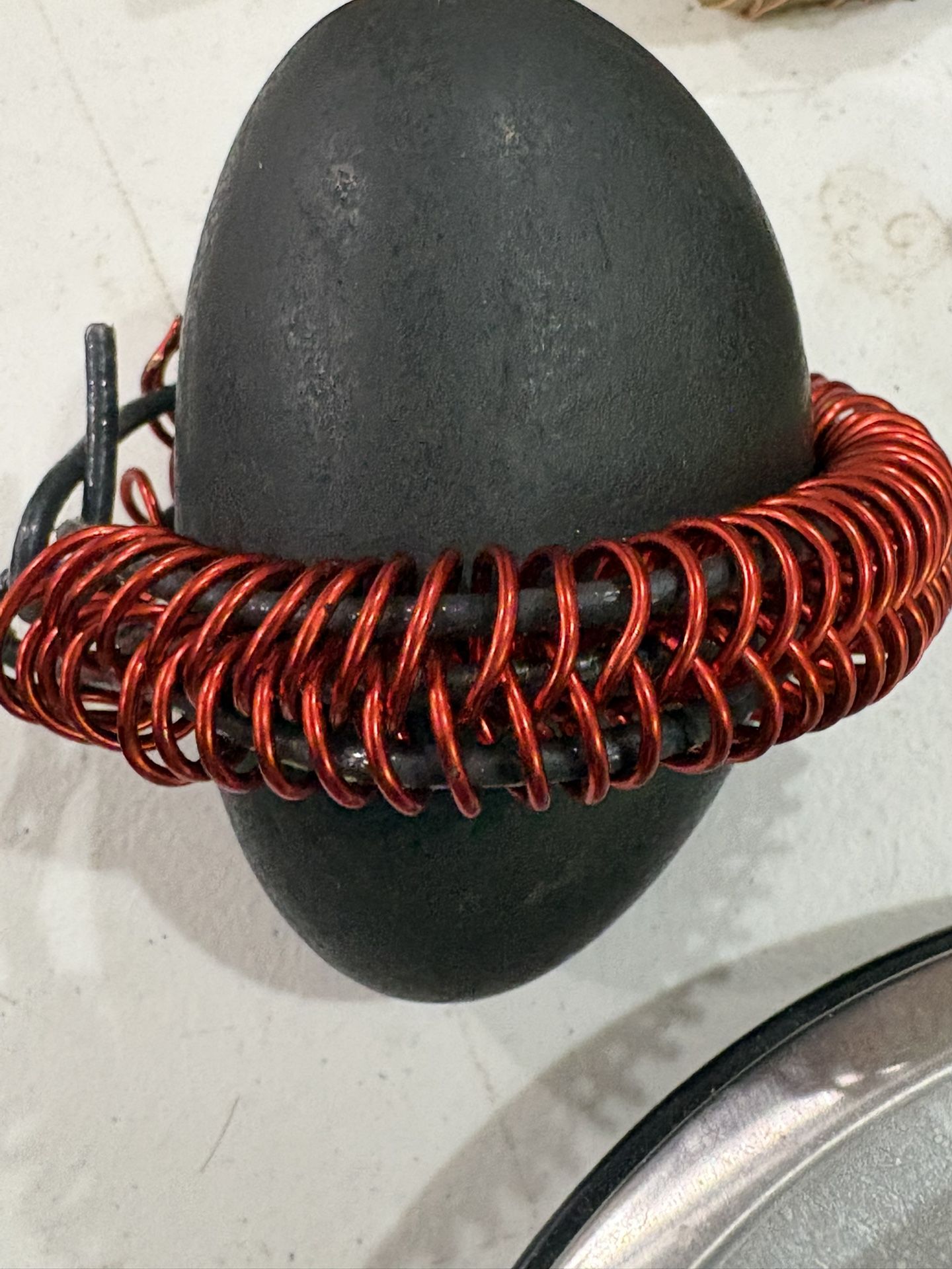 Crimson Circuit Relic - matte black egg relic with red coil