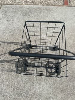 Like Brand New only used 1 time Metal Shopping Cart