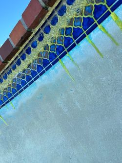 Pool tile acid chemicals drain
