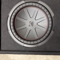 Kicker comp R loaded enclosure with soundstream amp