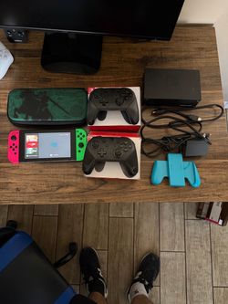 Nintendo Switch + 2 Pro Controllers