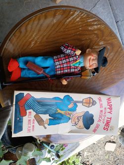 Antique Happy times wind up drunken doll