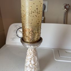 Shell filled candle stick holder with battery operated candle batteries not 