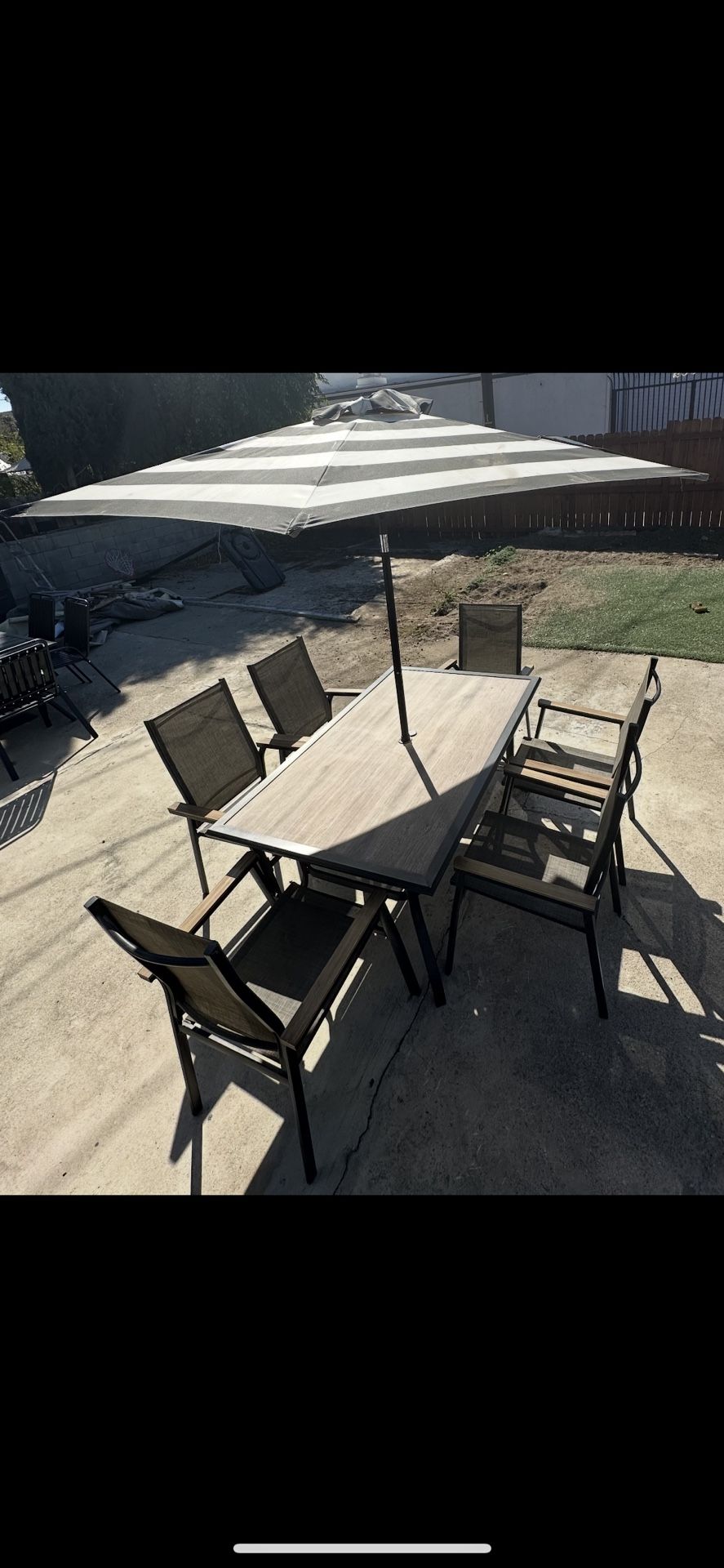 Patio Table And Six Chairs With Umbrella 