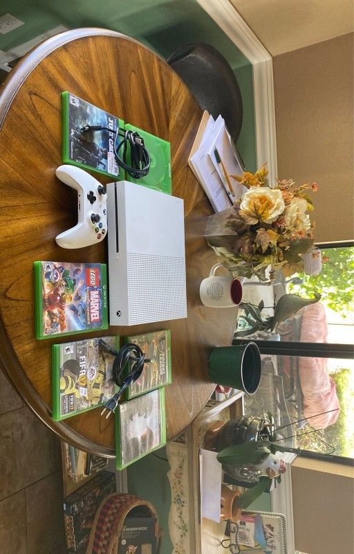 xbox one s am giving it out to bless someone who first wish me happy wedding anniversary on my cellphone number now  707^340^9916