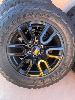GMC stock wheels and Toyo tires
