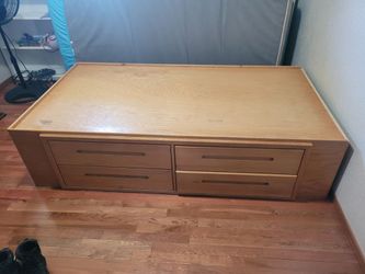 Twin Wood bed with 4 drawers. Heavy.solid