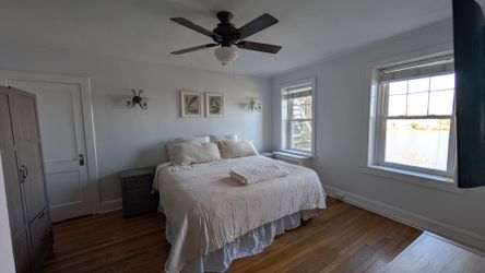 King size bed, TV stand, glass front cabinet, coffee bar