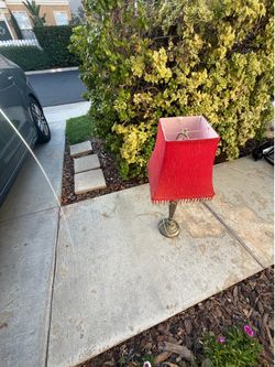 Lamp with red shade