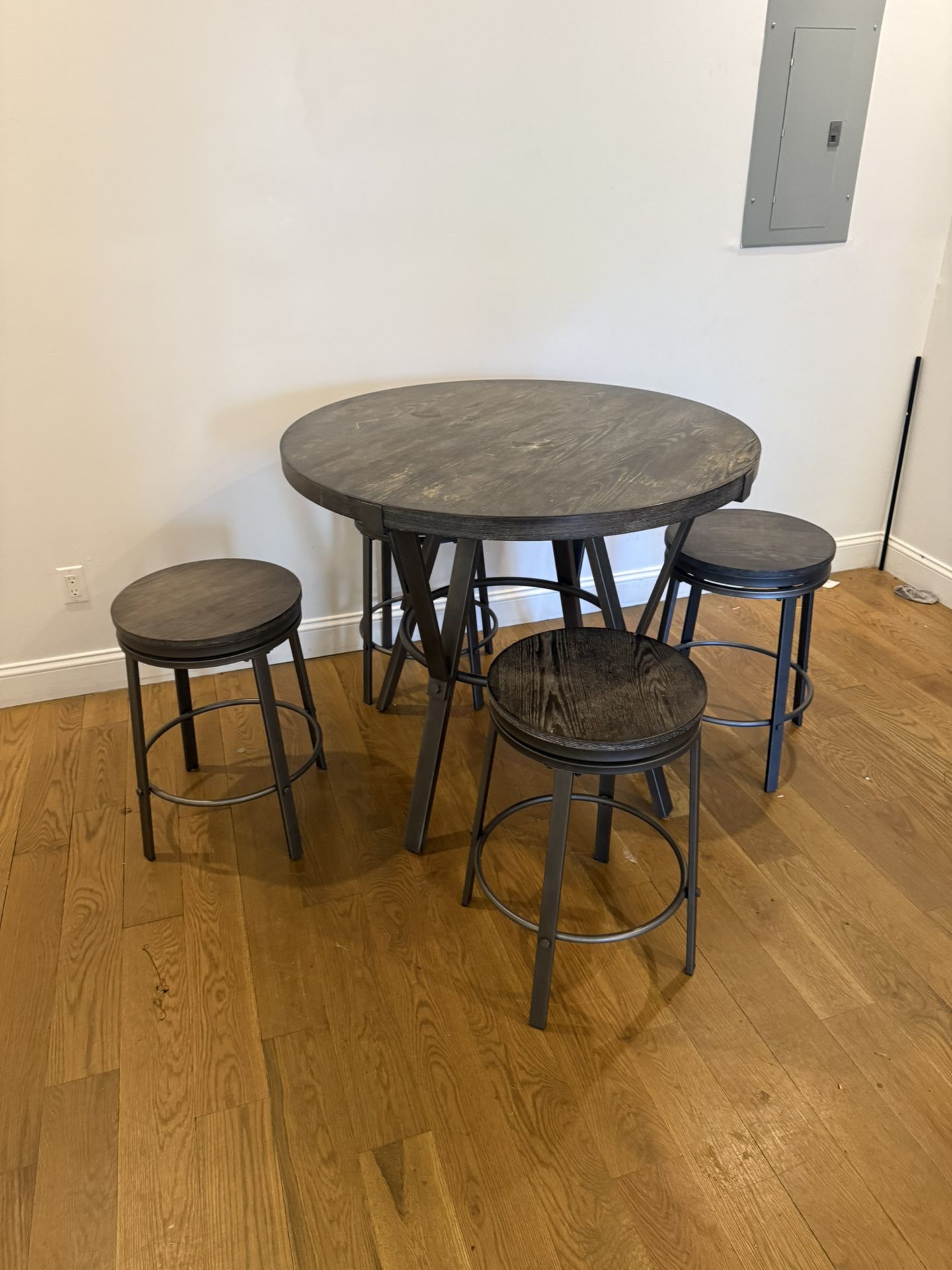 Four Stools And Table
