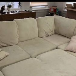 Gray  Modular Sectional With Pull Put Bed And Beige Covers