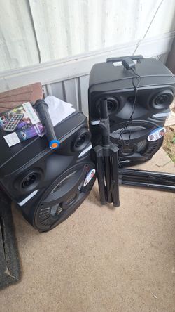 Pair of Bluetooth speakers lights and microphone