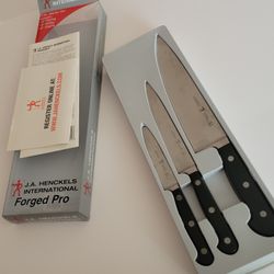 J.A. Henckels International Forged Pro 3-Piece Starter Knife Set . 
Pre-owned, good shape, in original package. The smallest, paring knife, 
has a cra