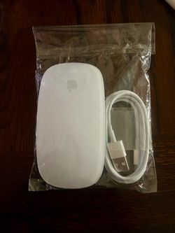 Apple Magic Mouse: Wireless, Bluetooth, Rechargeable.