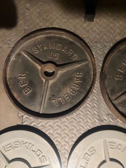 Pair of 45s Olympic weight plate workout weight set